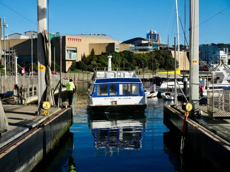 A launch motoring into the lift bay between the piers