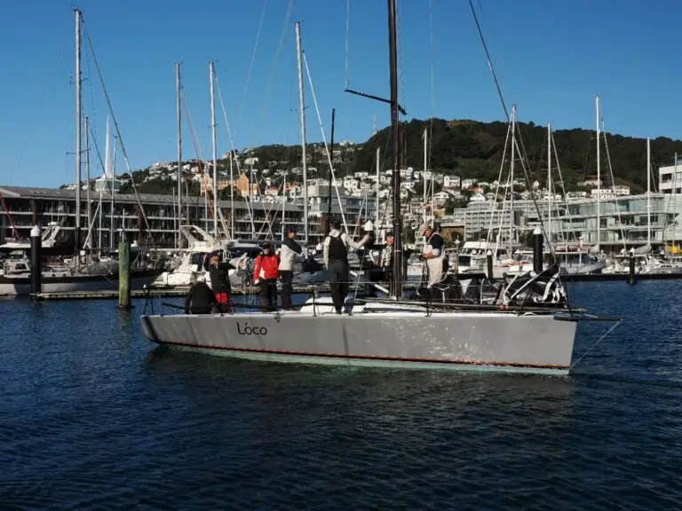 Yachts berthed at Chaffers Marina with the hills beyond