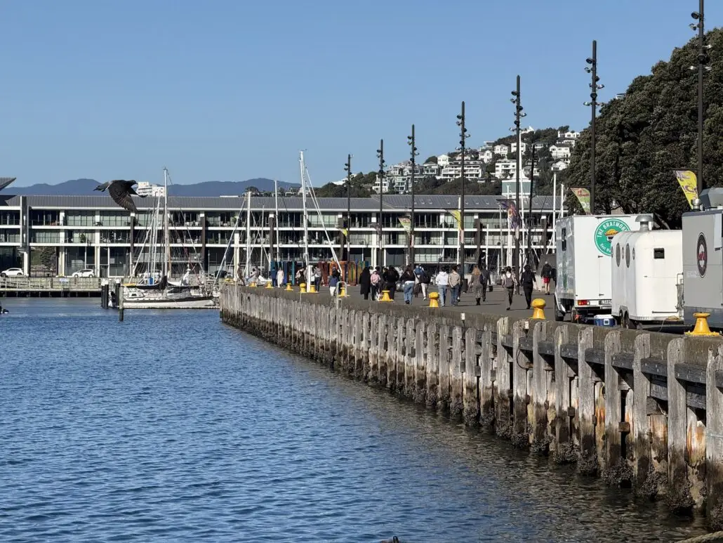 The Clyde Quay Wharf promenade beside Chaffers Marina, with food trucks and people walking