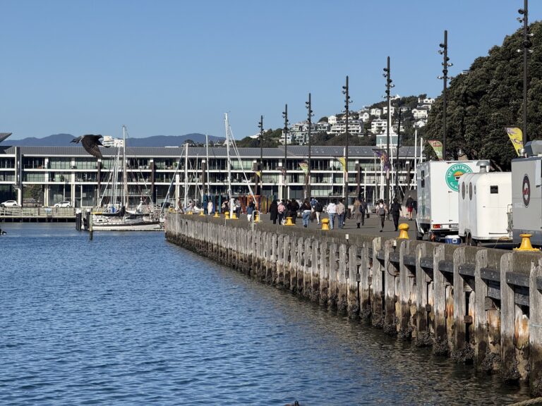 The Clyde Quay Wharf promenade beside Chaffers Marina, with food trucks and people walking