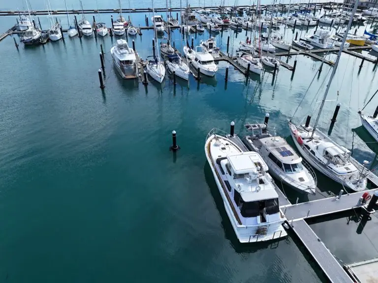 Looking down onto a new pier at Chaffers Marina, with moored boats and calm water